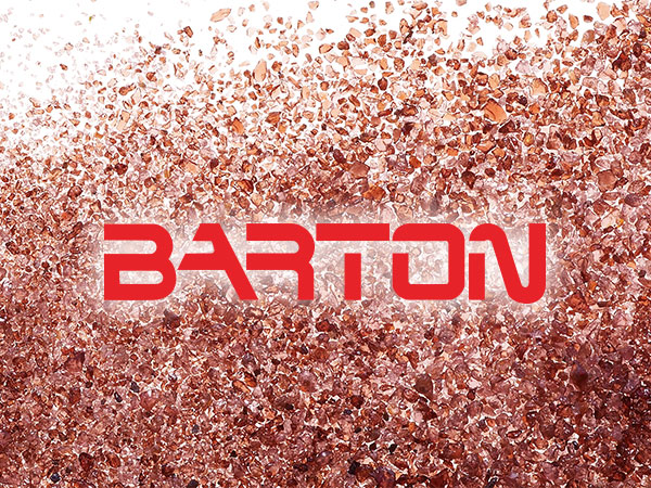 Image of Barton Mines logo on a field of garnet grains
